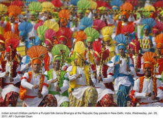 Indian school children perform a Punjabi folk dance Bhangra at the Republic Day parade in New Delhi, India, Wednesday, Jan. 26,
2011. AP / Gurinder Osan
 