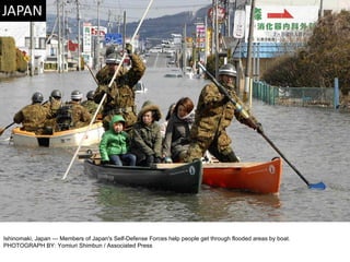 Ishinomaki, Japan — Members of Japan's Self-Defense Forces help people get through flooded areas by boat. PHOTOGRAPH BY: Yomiuri Shimbun / Associated Press 
