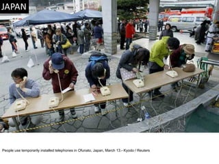 People use temporarily installed telephones in Ofunato, Japan, March 13.- Kyodo / Reuters  