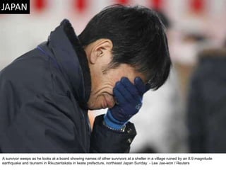 A survivor weeps as he looks at a board showing names of other survivors at a shelter in a village ruined by an 8.9 magnitude earthquake and tsunami in Rikuzentakata in Iwate prefecture, northeast Japan Sunday. - Lee Jae-won / Reuters 