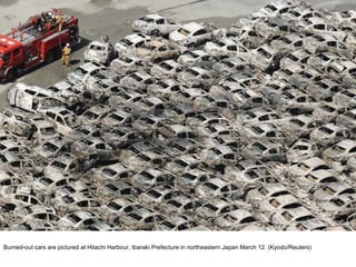 Burned-out cars are pictured at Hitachi Harbour, Ibaraki Prefecture in northeastern Japan March 12. (Kyodo/Reuters)  