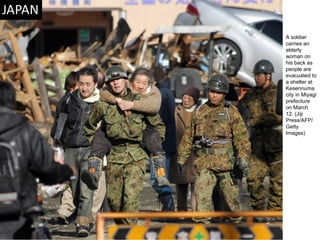 A soldier carries an elderly woman on his back as people are evacuated to a shelter at Kesennuma city in Miyagi prefecture on March 12. (Jiji Press/AFP/Getty Images)  
