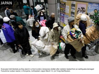 Evacuees hold blankets as they stand in a line to enter a temporary shelter after radiation leaked from an earthquake-damaged Fukushima nuclear reactor, in Koriyama, northeastern Japan March 12. (Jo Yong-Hak/Reuters  
