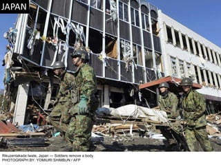 Rikuzentakada Iwate, Japan — Soldiers remove a body. PHOTOGRAPH BY: YOMIURI SHIMBUN / AFP 