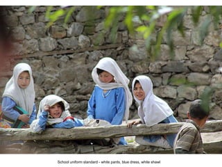 School uniform standard - white pants, blue dress, white shawl 