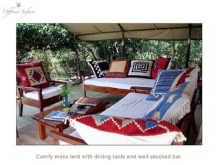 Comfy mess tent with dining table and well stocked bar 