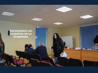 RECOGIENDO LAS
CAMISETAS DE LA
  OLIMPIADA
 