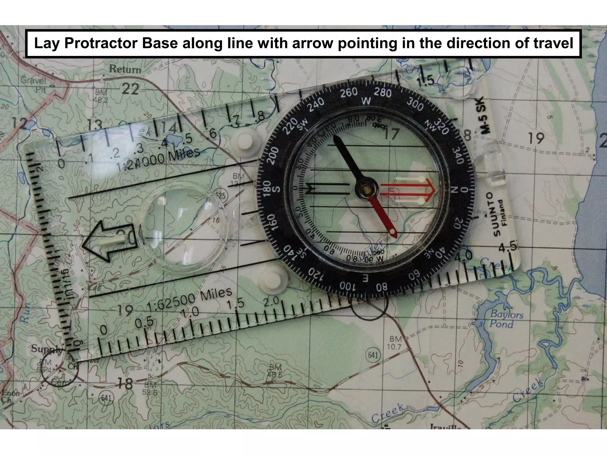 Lay Protractor Base along line with arrow pointing in the direction of travel
 