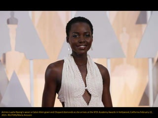 Actress Lupita Nyong'o wears a Calvin Klein gown and Chopard diamonds as she arrives at the 87th Academy Awards in Hollywo...
