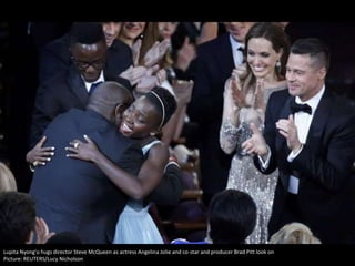 Lupita Nyong'o hugs director Steve McQueen as actress Angelina Jolie and co-star and producer Brad Pitt look on
Picture: REUTERS/Lucy Nicholson

 