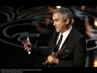 Alfonso Cuaron accepts the Oscar for Best Director for Gravity
Picture: REUTERS/Lucy Nicholson

 