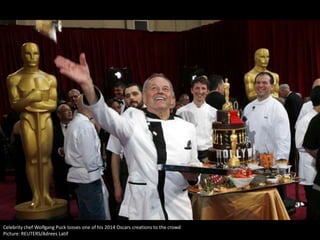 Celebrity chef Wolfgang Puck tosses one of his 2014 Oscars creations to the crowd
Picture: REUTERS/Adrees Latif

 