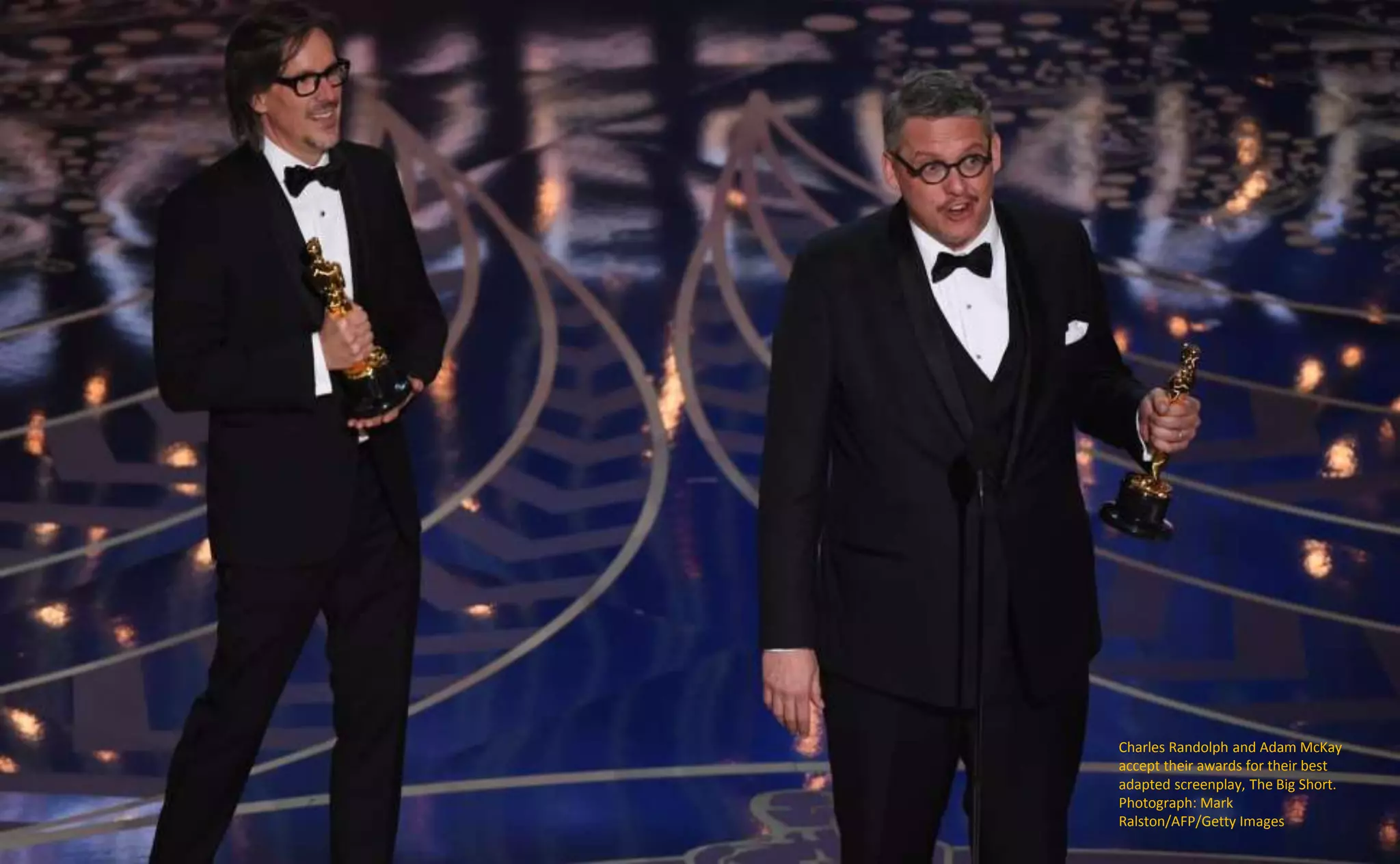 Charles Randolph and Adam McKay
accept their awards for their best
adapted screenplay, The Big Short.
Photograph: Mark
Ralston/AFP/Getty Images
 