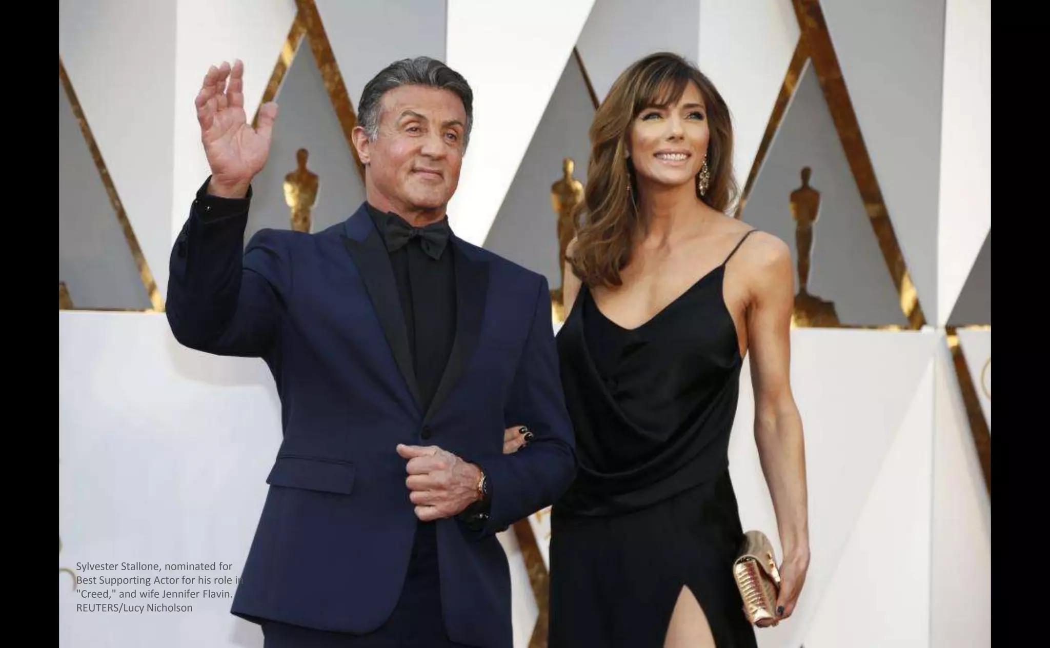 Sylvester Stallone, nominated for
Best Supporting Actor for his role in
"Creed," and wife Jennifer Flavin.
REUTERS/Lucy Nicholson
 