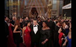 Matt Damon, nominated for Best Actor for
his role in "The Martian," and his wife
Luciana Barroso (L) pose with presenter
Whoopi Goldberg (R). REUTERS/Lucas
Jackson
 