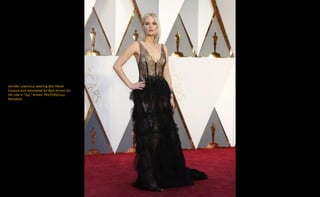 Jennifer Lawrence, wearing Dior Haute
Couture and nominated for Best Actress for
her role in "Joy," arrives. REUTERS/Lucy
Nicholson
 