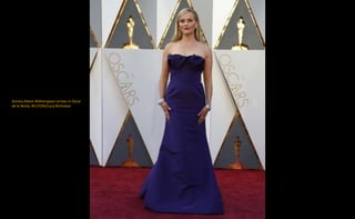 Actress Reese Witherspoon arrives in Oscar
de la Renta. REUTERS/Lucy Nicholson
 