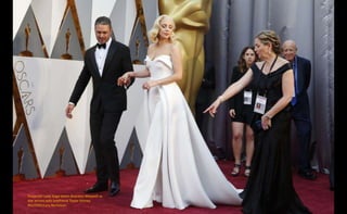 Presenter Lady Gaga wears Brandon Maxwell as
she arrives with boyfriend Taylor Kinney.
REUTERS/Lucy Nicholson
 