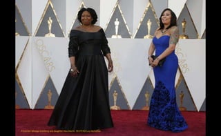 Presenter Whoopi Goldberg and daughter Alex Martin. REUTERS/Lucy Nicholson
 