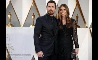Christian Bale, nominated for Best Supporting Actor
for his role in "The Big Short," arrives with wife Sibi
Blazic. REUTERS/Lucy Nicholson
 
