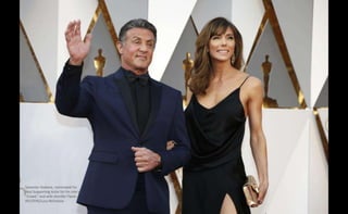 Sylvester Stallone, nominated for
Best Supporting Actor for his role in
"Creed," and wife Jennifer Flavin.
REUTERS/Lucy Nicholson
 