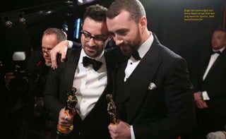 Singer Sam Smith (right) and
Jimmy Napes accept their best
song award for Spectre. Matt
Sayles/Invision/AP
 