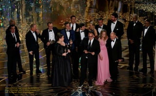 Producer Michael Sugar accepts the best picture
Oscar for Spotlight, with his fellow producers and
cast. Photograph: Mario...