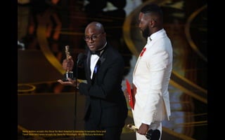 Barry Jenkins accepts the Oscar for Best Adapted Screenplay Screenplay Story and
Tarell Alvin McCraney accepts for Story f...