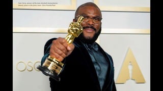 Tyler Perry, winner of the Jean Hersholt Humanitarian
Award, poses in the press room. Chris Pizzello/Pool
 
