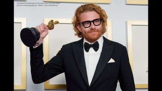 Erik Messerschmidt poses in the press room with the award
for best cinematography for "Mank". Chris Pizzello/Pool
 