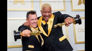 Martin Desmond Roe and Travon Free pose with award for Best Live Action Short Film for "Two Distant Strangers" in the press room. Chris Pizzello/Pool
 