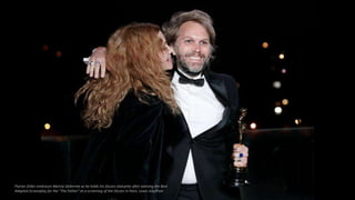 Florian Zeller embraces Marine Delterme as he holds his Oscars statuette after winning the Best
Adapted Screenplay for the "The Father" at a screening of the Oscars in Paris. Lewis Joly/Pool
 