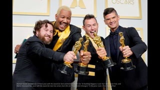 Michael Govier and Will McCormack pose with the award for best animated short film for "If Anything Happens I Love You" and Travon Free, and
Martin Desmond Roe, pose with the award for best live action short film for "Two Distant Strangers" in the press room. Chris Pizzello/Pool
 