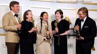 Producers Peter Spears, from left, Frances McDormand and Chloe Zhao, Mollye Asher and Dan
Janvey, winners of the award for...