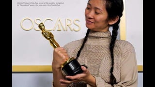 Director/Producer Chloe Zhao, winner of the award for best picture
for "Nomadland," poses in the press room. Chris Pizzello/Pool
 