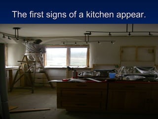 The first signs of a kitchen appear. 