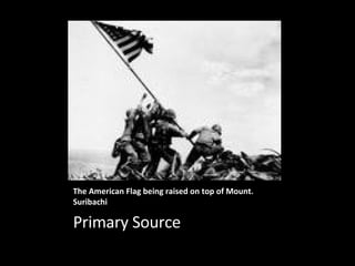 The American Flag being raised on top of Mount. Suribachi Primary Source 