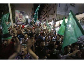 Palestinians celebrate victory by Palestinians in Gaza over Israel