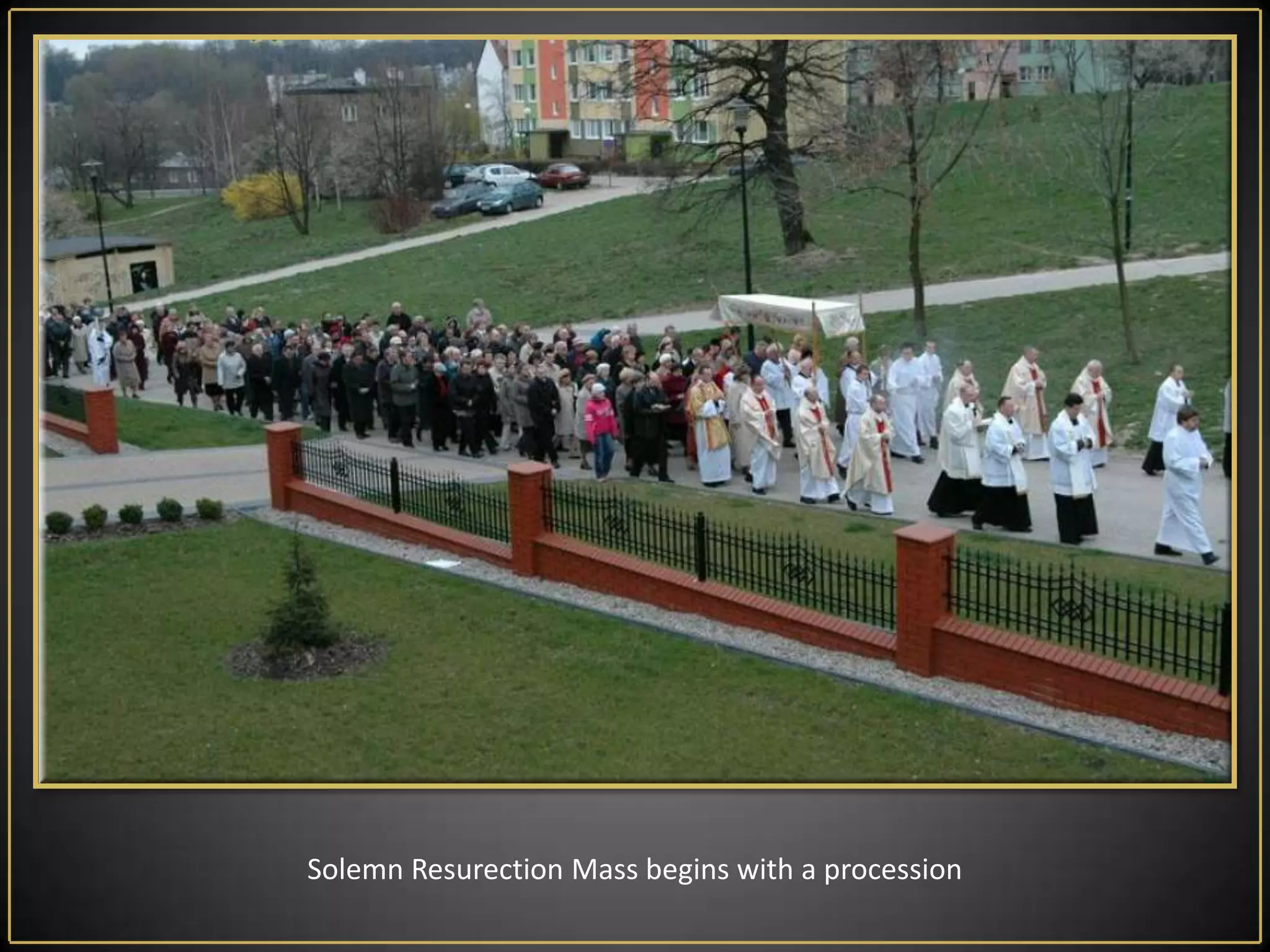 The faithful light their candles from the paschal candle, the inside of the church is filled with light