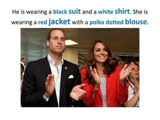 He is wearing a black suit and a white shirt. She is
wearing a red jacket with a polka dotted blouse.

 