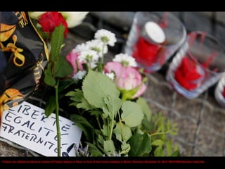 A makeshift memorial honoring the victims of the terror attack in Paris is seen outside the Consulate General of France in...
