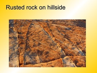 Rusted rock on hillsideRusted rock on hillside
 