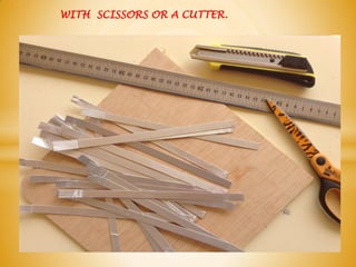 WITH SCISSORS OR A CUTTER.
 