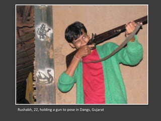 Rushabh, 22, holding a gun to pose in Dangs, Gujarat 