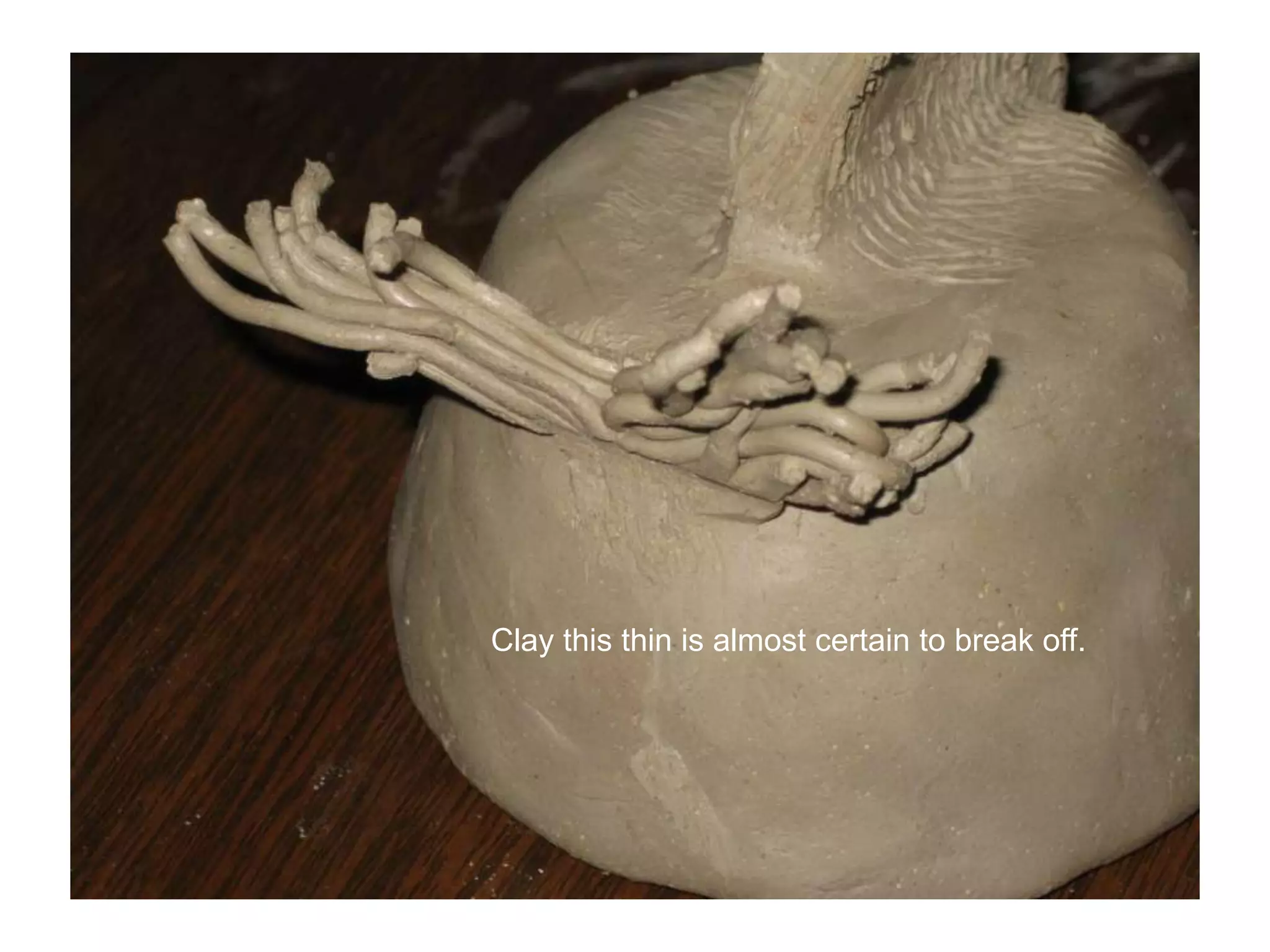 Clay this thin is almost certain to break off.