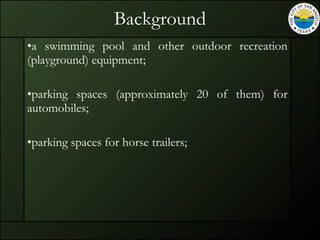 Background a swimming pool and other outdoor recreation (playground) equipment; parking spaces (approximately 20 of them) for automobiles; parking spaces for horse trailers; 