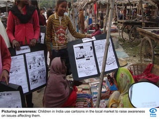 Picturing awareness:  Children in India use cartoons in the local market to raise awareness on issues affecting them. 