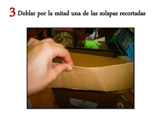 3 Doblar por la mitad una de las solapas recortadas
 