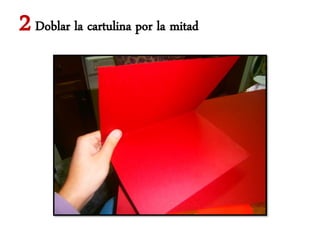 2 Doblar la cartulina por la mitad
 