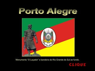 Monumento “O Laçador” e bandeira do Rio Grande do Sul ao fundo.
 